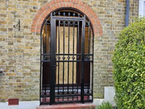 Modern sleek design arch style metal security gate - Atlantic Security